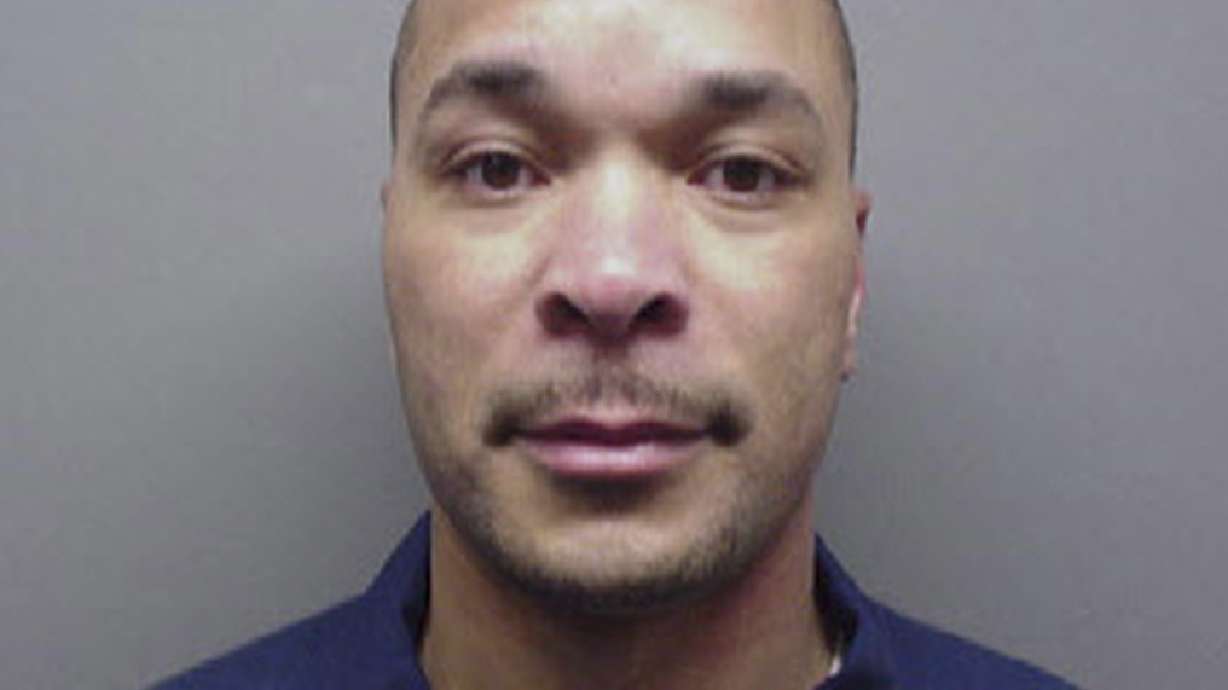 The Latest: Dad charged with killing 4 kids, torturing wife