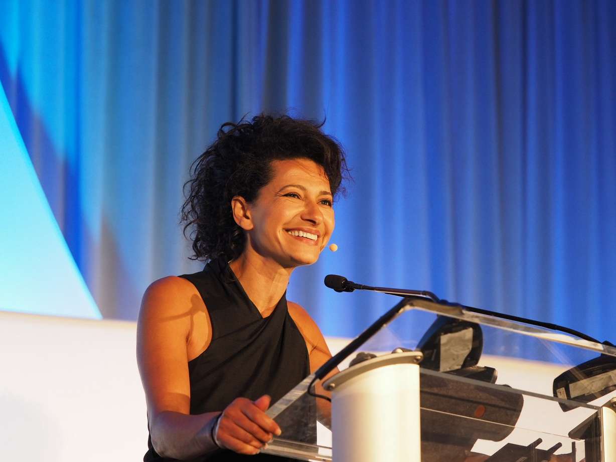 Julie Hanna, Presidential Ambassador of Global Entrepreneurship, addresses the audience at the Women Tech Council Awards at the Grand America on Thursday, Sept. 22, 2016. Hanna was the keynote speaker at the event honoring achievement by women in technology and business in Utah. (Photo: Brock Best Photography)