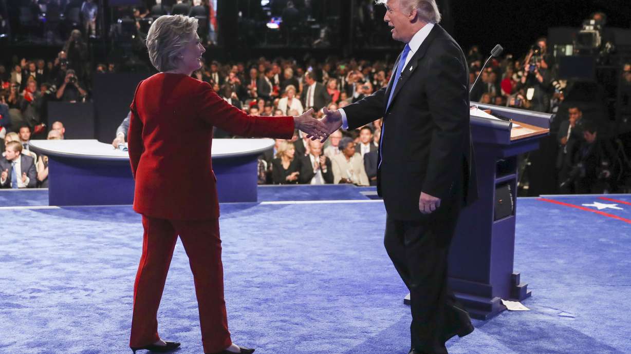 AP FACT CHECK: Trump, Clinton deny their own words in debate