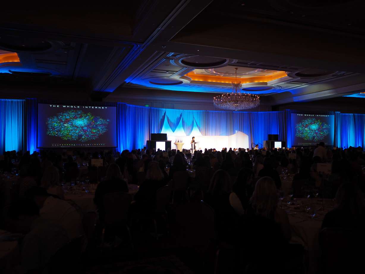 Julie Hanna, presidential ambassador of Global Entrepreneurship, addresses the audience at the Women Tech Council awards at Grand America Thursday, Sept. 22, 2016. Hanna was the keynote speaker at the event honoring achievement by women in technology and business in Utah. (Photo: Women Tech Council, Brock Best Photography)
