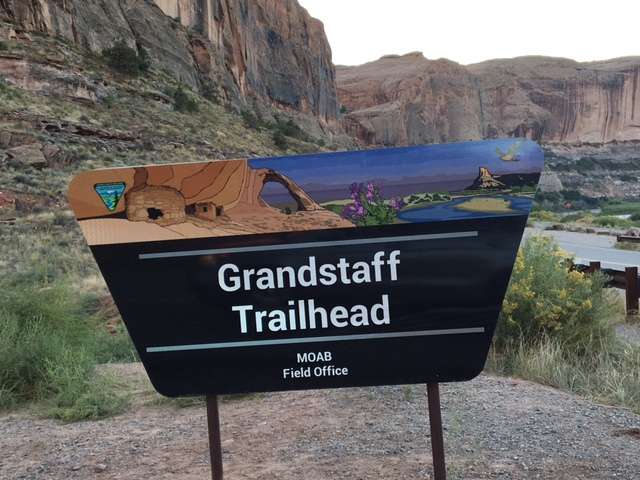 This Bureau of Land Management sign replaced the "Negro Bill" trailhead sign over the weekend of Sept. 24-25, 2016, in the Colorado River corridor outside Moab. The federal agency has adopted a "new look" in signage for many of its popular recreation areas, and removing the outdated term offensive to many has been part of a long-term, ongoing effort. The name now bears the last name of the African-American cowboy who used to run cattle in the area. (Photo: Michele Johnson, Bureau of Land Management)