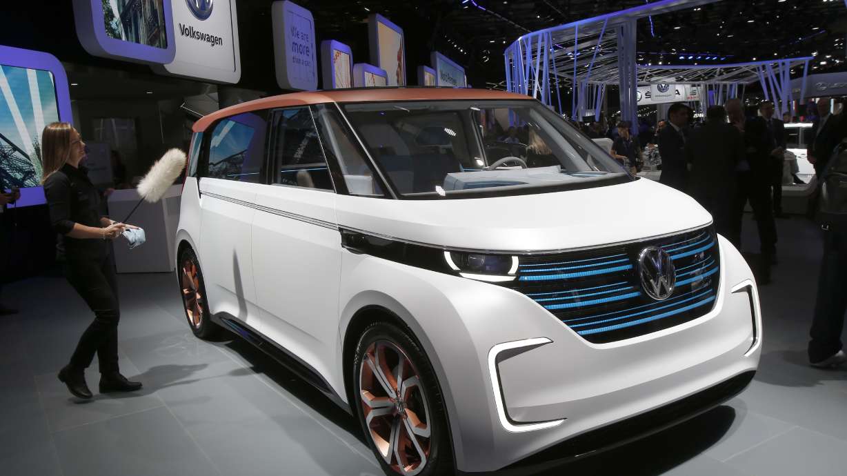 Electrics touted at Paris car show, but await their moment