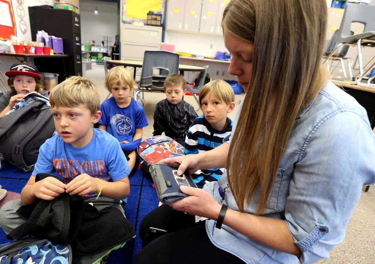 Sandy Joder, a school nurse, checks the blood sugar of first-grader Alex Adrian, who has Type 1 diabetes, at Trailside Elementary School in Park City on Monday, Sept. 26, 2016. Photo: Kristin Murphy, Deseret News