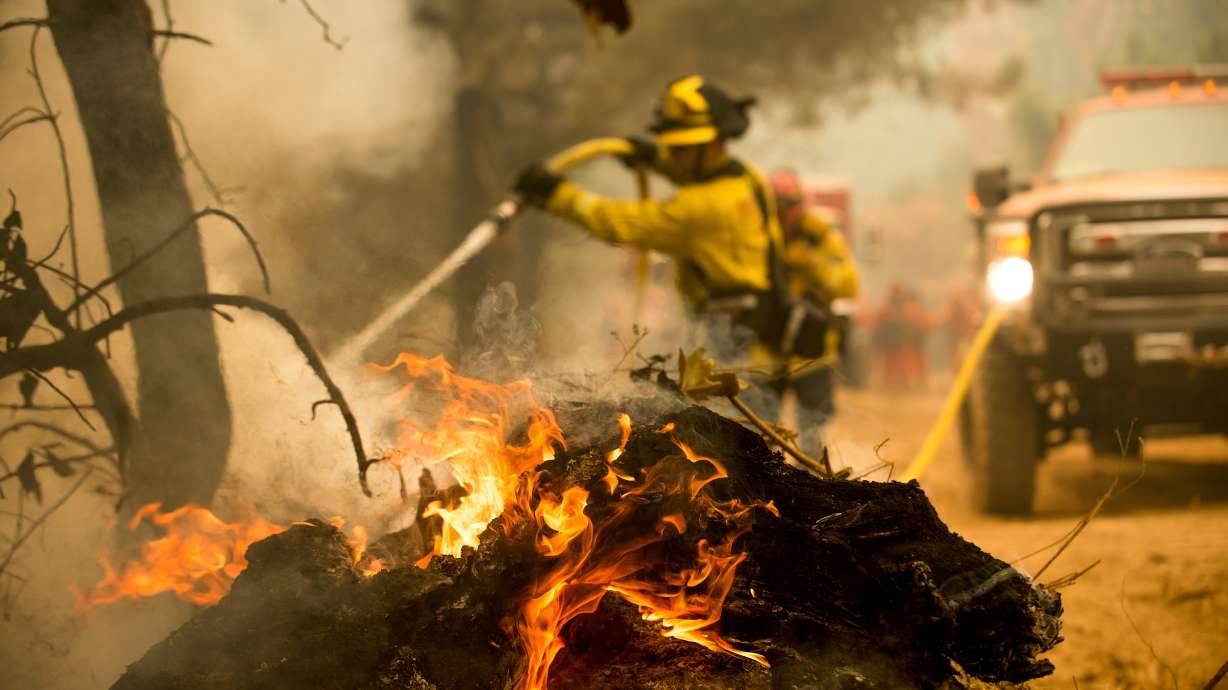 The Latest: Northern California wildfire has burned 8 homes