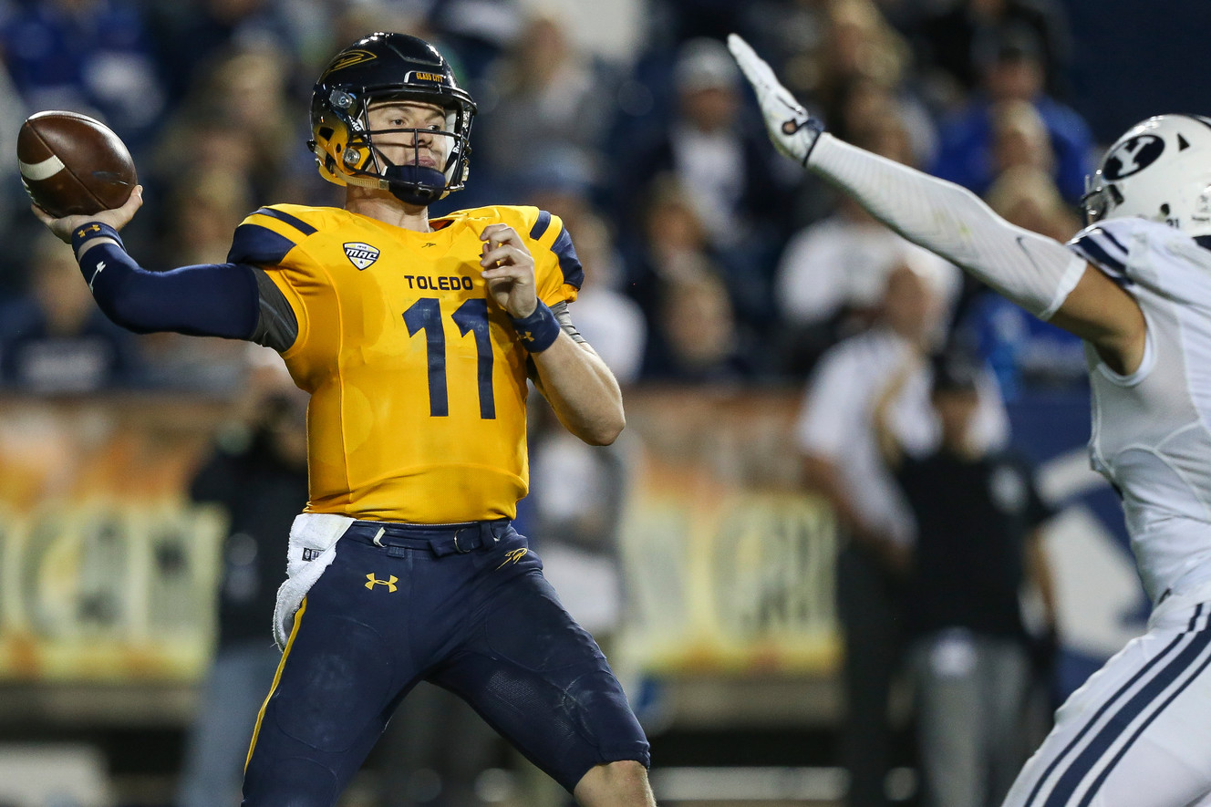 Toledo quarterback Logan Woodside (11) throws a pass during a game against BYU at LaVell Edwards Stadium in Provo on Friday, Sept. 30, 2016. (Photo: Spenser Heaps, Deseret News)