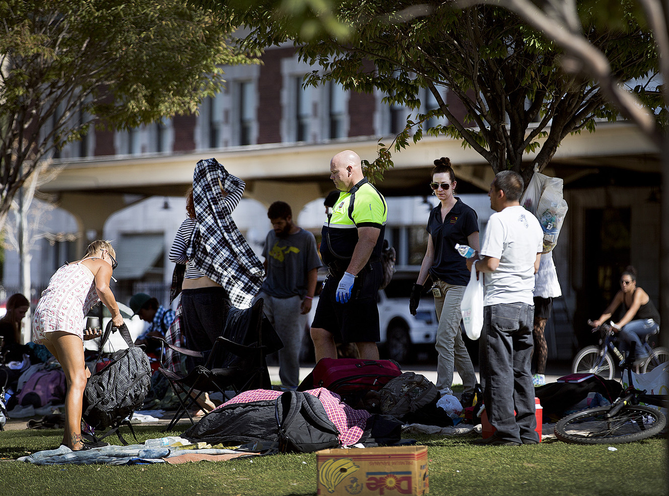 Salt Lake City police officer Lyman Smith and Karla Bartholomew, a health scientist with the Salt Lake County Health Department, ask homeless people to remove their belongings from 500 West on Wednesday, Sept. 28, 2016. (Photo: Laura Seitz, Deseret News)