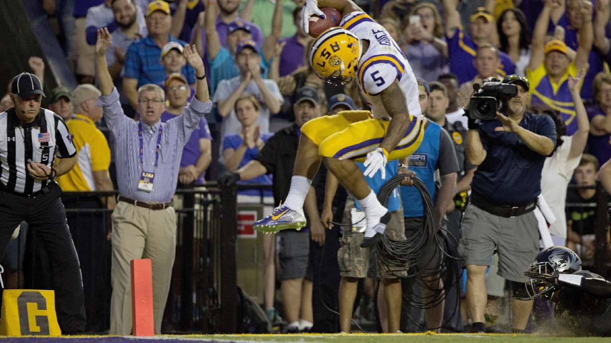 Guice helps LSU open Orgeron era with 42-7 win over Missouri