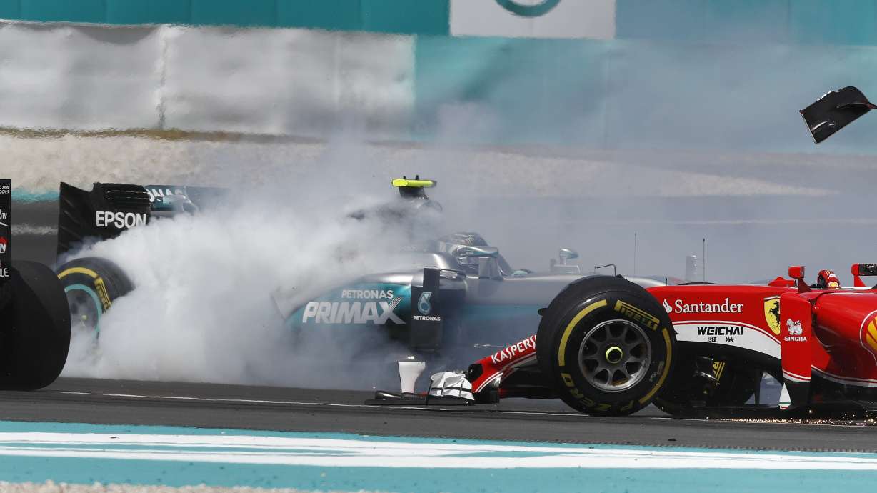 Vettel angers rivals with first-corner collision