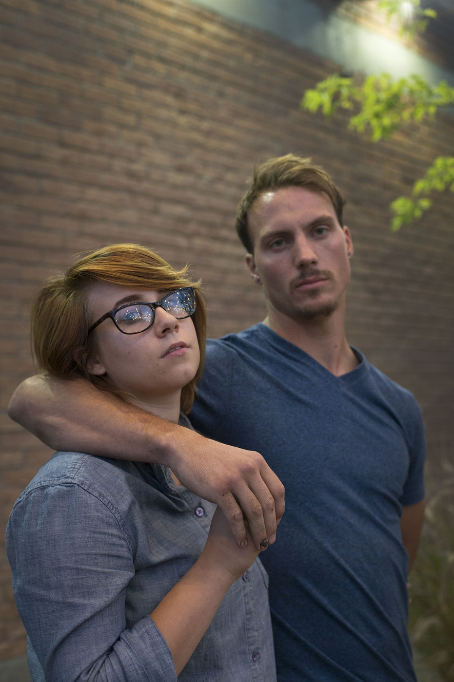 Raneal Christensen, right, and his girlfriend, Somerville Hosier, are pictured in Salt Lake City on Thursday, Sept. 29, 2016. On Aug. 29, 2016, Christensen and Hosier were at a stop light in his car and was hit by the car behind them. As Christensen was surveying the damage, he "jumped on the hood of the Jaguar" to try and prevent the driver from leaving. Christensen hung onto the hood as the driver accelerated to 60 mph, swerving back and forth attempting to eject him from the hood. Eventually the car pulled over, and the driver got out and pointed a gun at Christensen. (Photo: Laura Seitz, Deseret News)