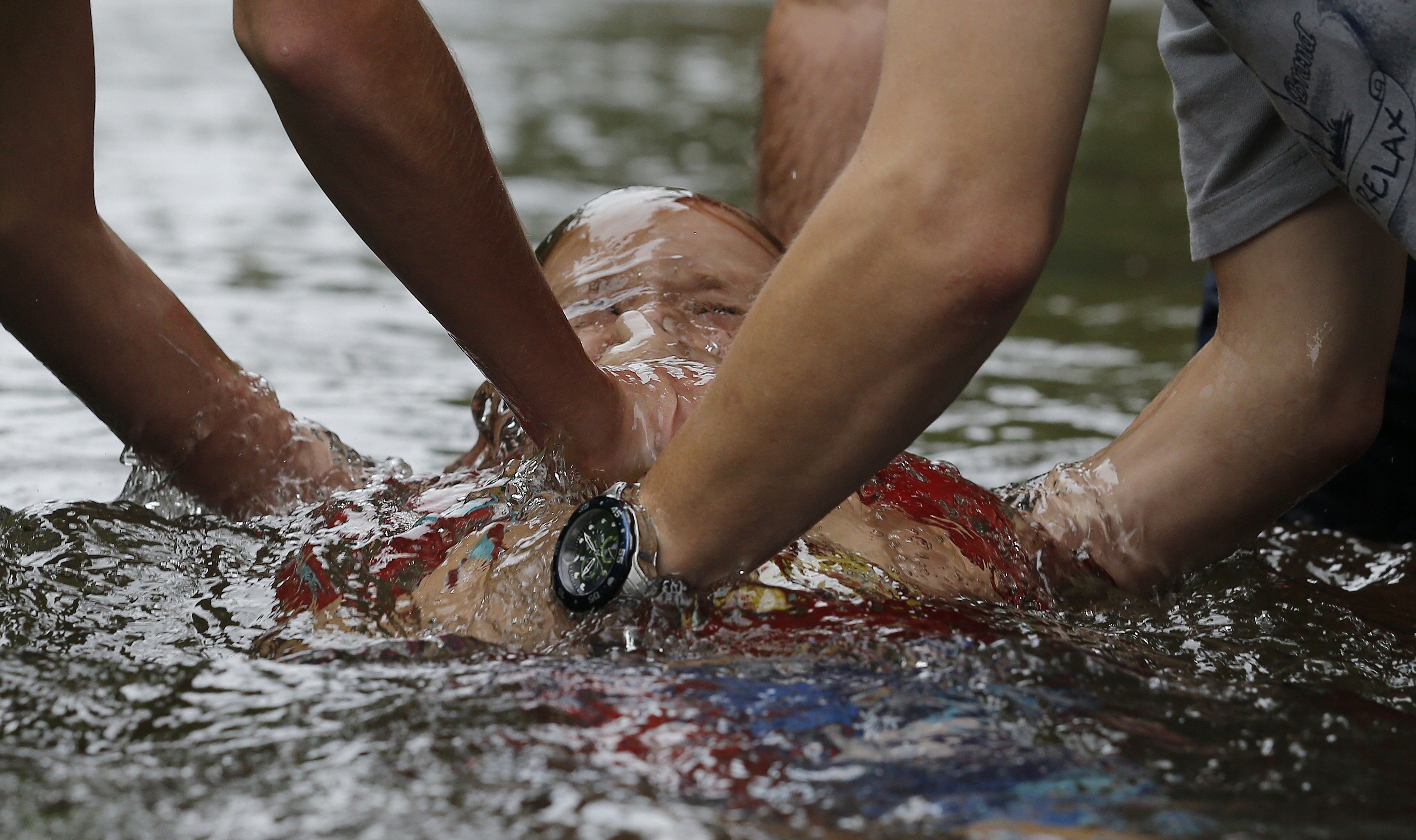 River baptisms: 'Surrendering themselves' to water, Christ