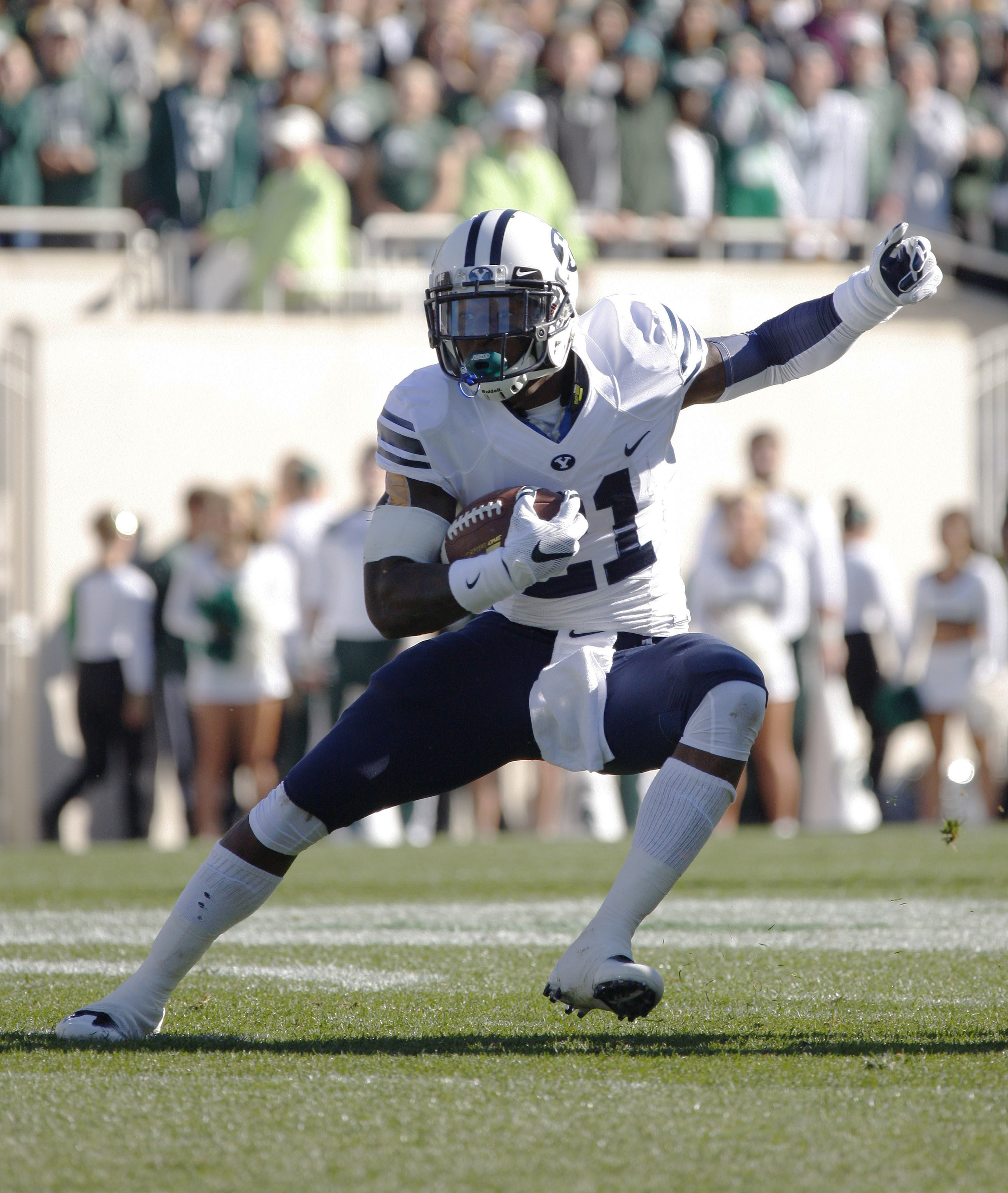 BYU's Jamaal Williams rushes against Michigan State during the first quarter of an NCAA college football game, Saturday, Oct. 8, 2016, in East Lansing, Mich. (AP Photo/Al Goldis)