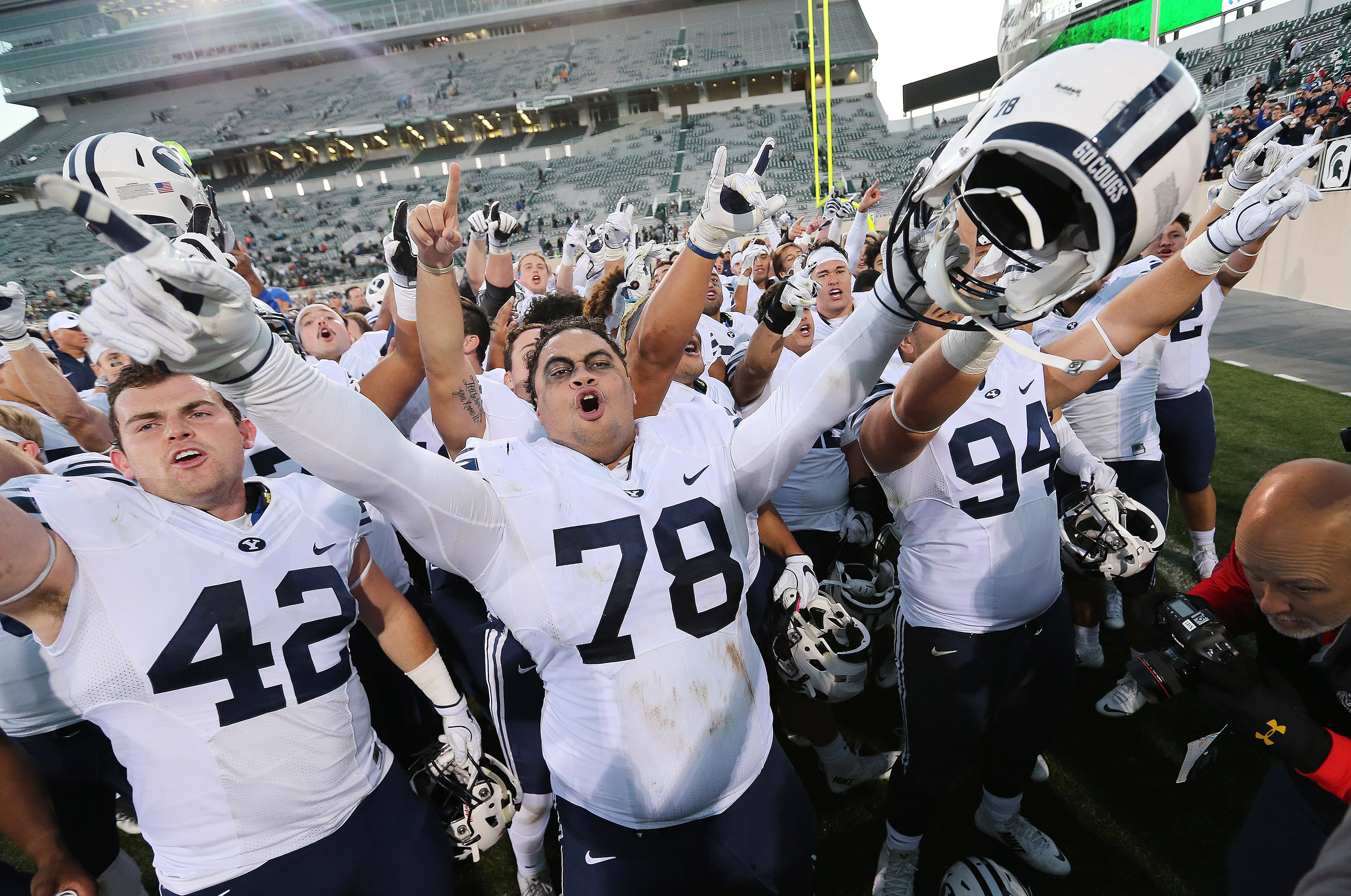 BYU offensive lineman Tuni Kanuch (78) cheers with teammates after beating the Michigan State Spartans in East Lansing, MI on Saturday, Oct. 8, 2016. BYU won 31-14. (Photo: Jeffrey D. Allred, Deseret News)
