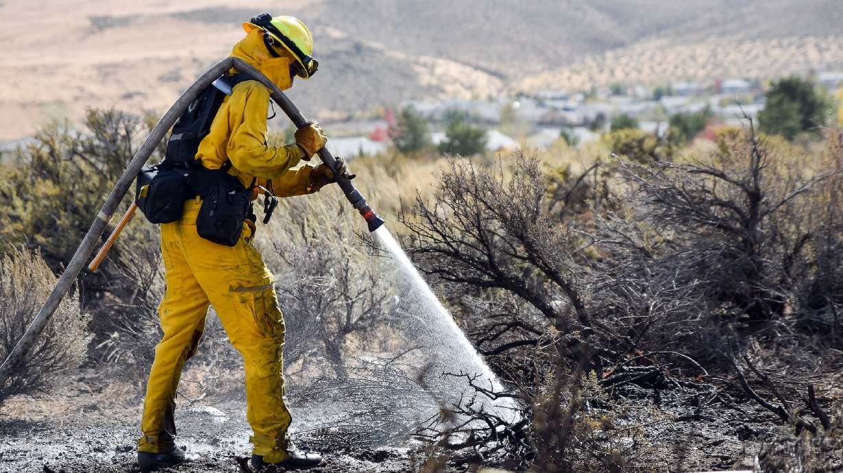 The Latest: 22 homes destroyed in Nevada wildfire
