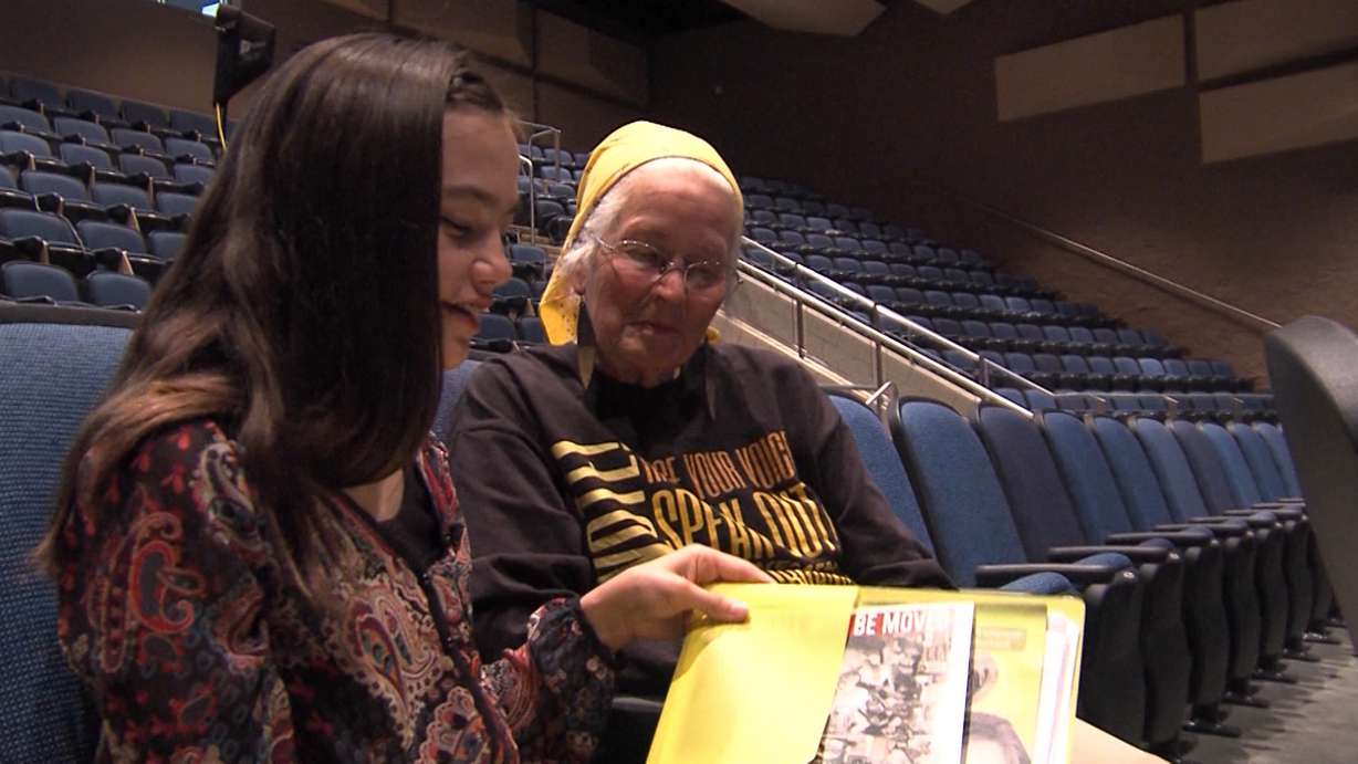 Jamison Thatch visits with her hero, Civil Rights leader Joan Trumpauer Mulholland, who was the keynote speaker at the Utah Council for the Social Studies Conference in Cottonwood Heights Saturday, Oct. 15, 2016. (Photo: KSL TV)
