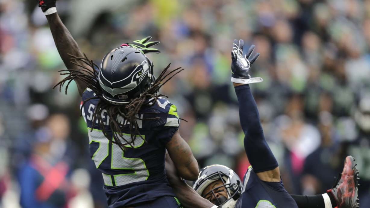 Wilson leads Seattle's late rally for 26-24 win over Atlanta