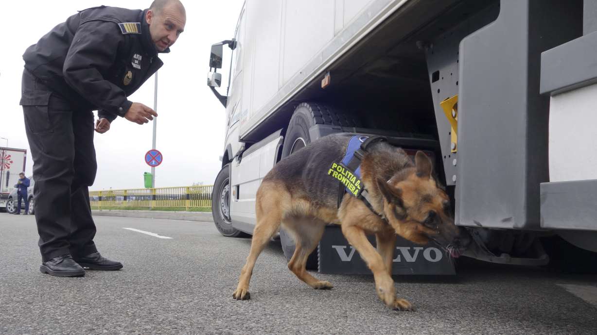 The Latest: Hungary PM likens border closure to Iron Curtain