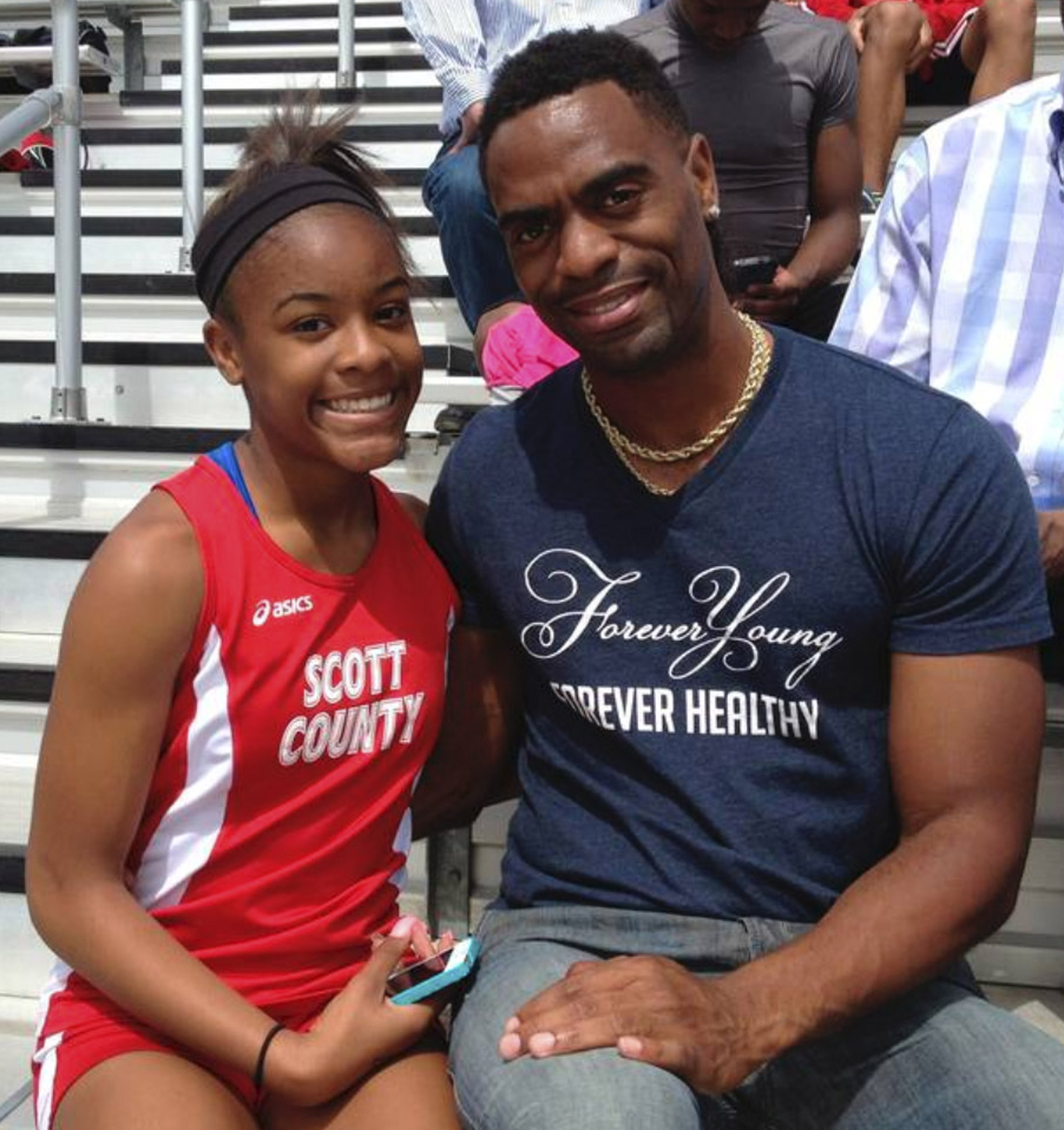 The Latest: Tyson Gay at large vigil after daughter's death