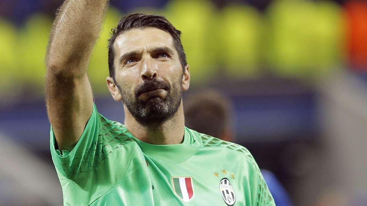 Buffon back to his brilliant best as Juve wins at Lyon