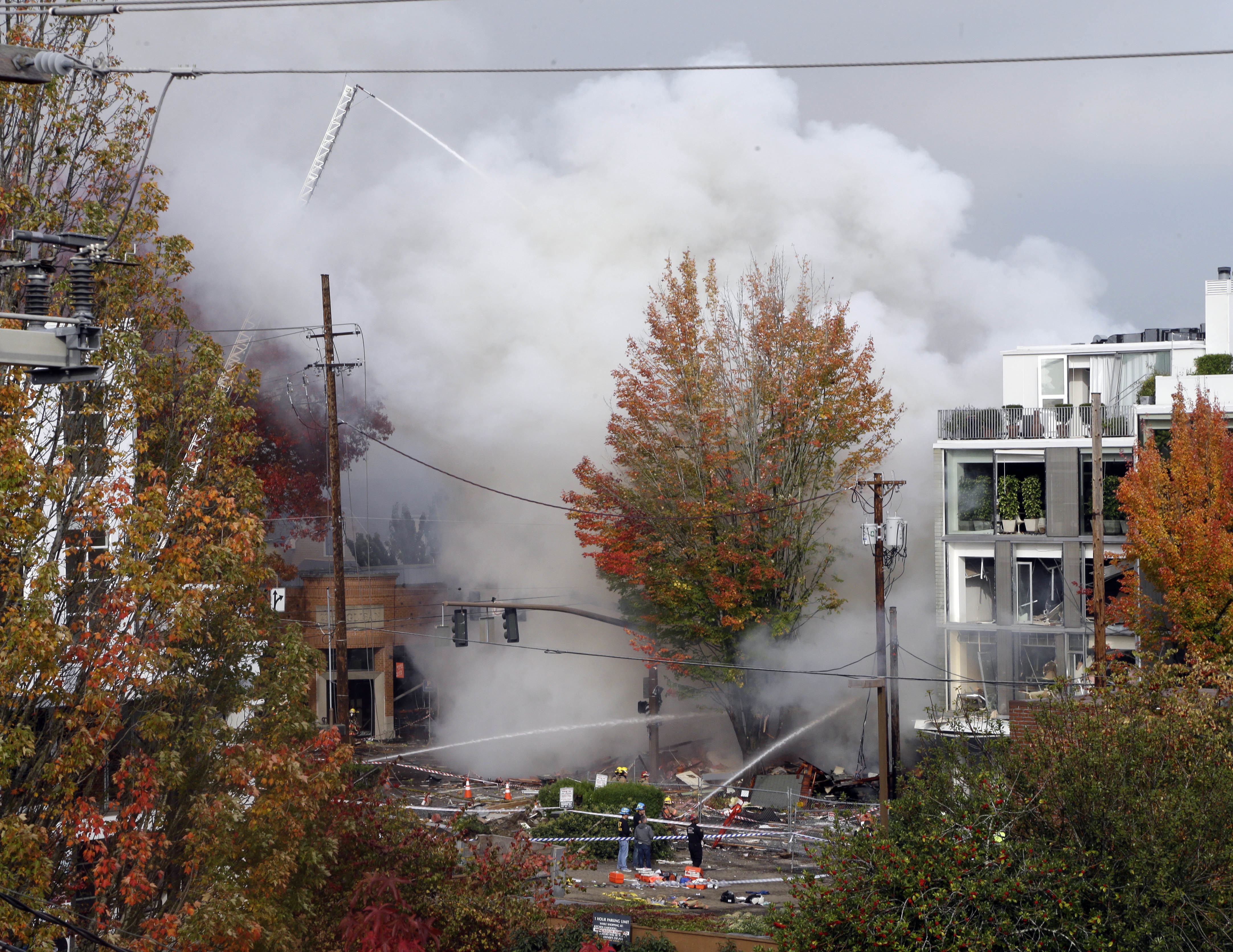The Latest: Firefighter thrown 20 feet by gas explosion