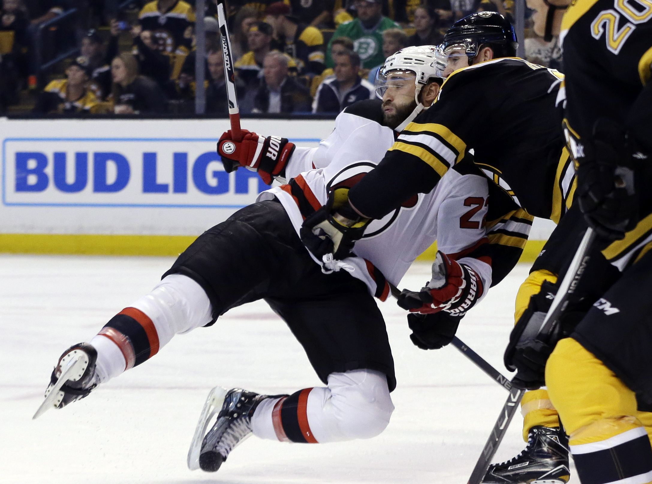 Bergeron returns, leads Bruins to 2-1 victory over Devils