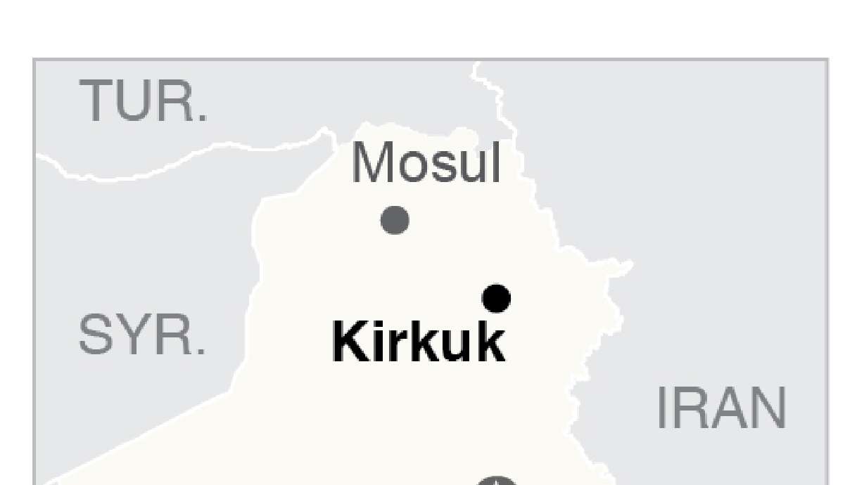 The Latest: Iraqis raise flag over church in town near Mosul