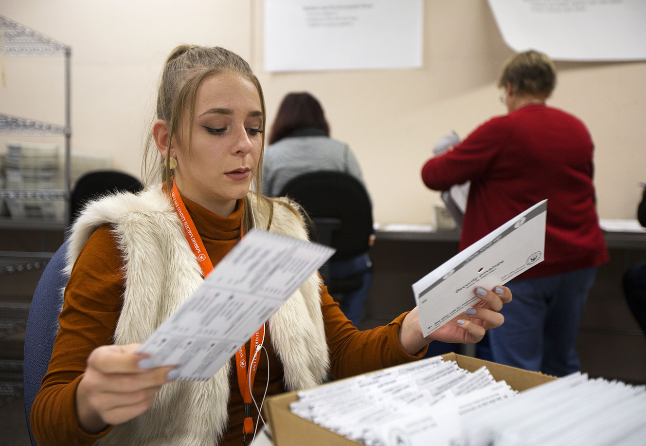 Skyla Price, an elections specialist, sorts ballots at the Salt Lake County Government Center in Salt Lake City, Friday, Oct. 21, 2016. (Photo: Hans Koepsell, Deseret News)