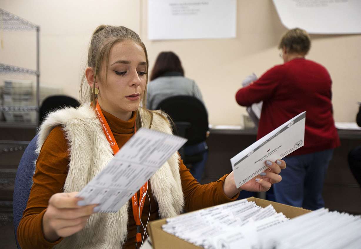 Skyla Price, an elections specialist, sorts ballots at the Salt Lake County Government Center in Salt Lake City, Friday, Oct. 21, 2016. (Photo: Hans Koepsell, Deseret News)