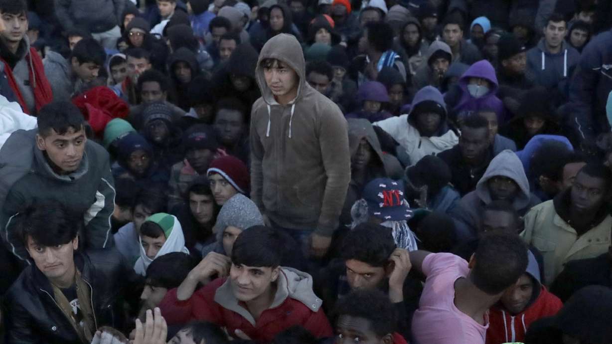 Evacuation in progress, crews tear down French migrant camp