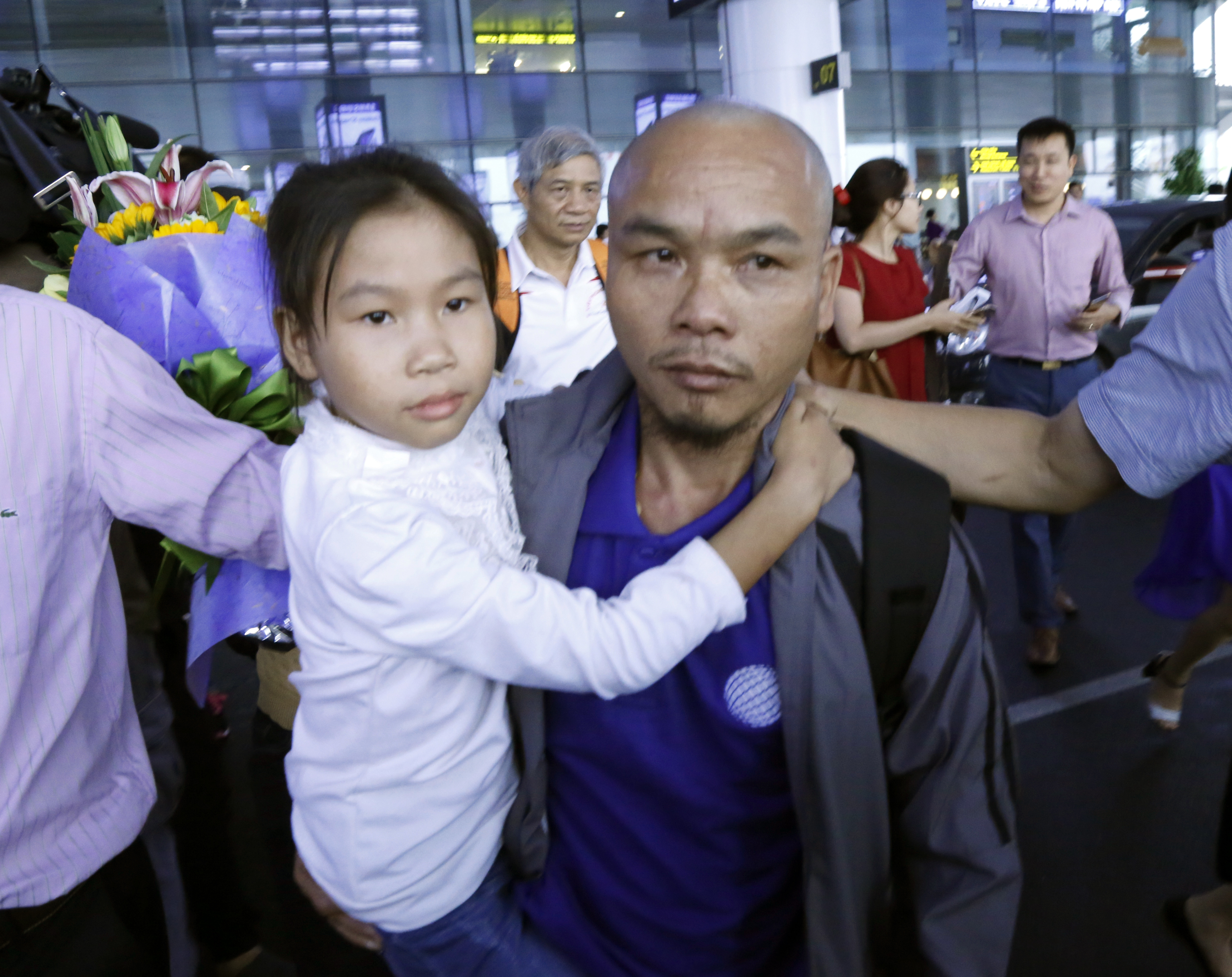 3 Vietnamese sailors freed by Somali pirates return home