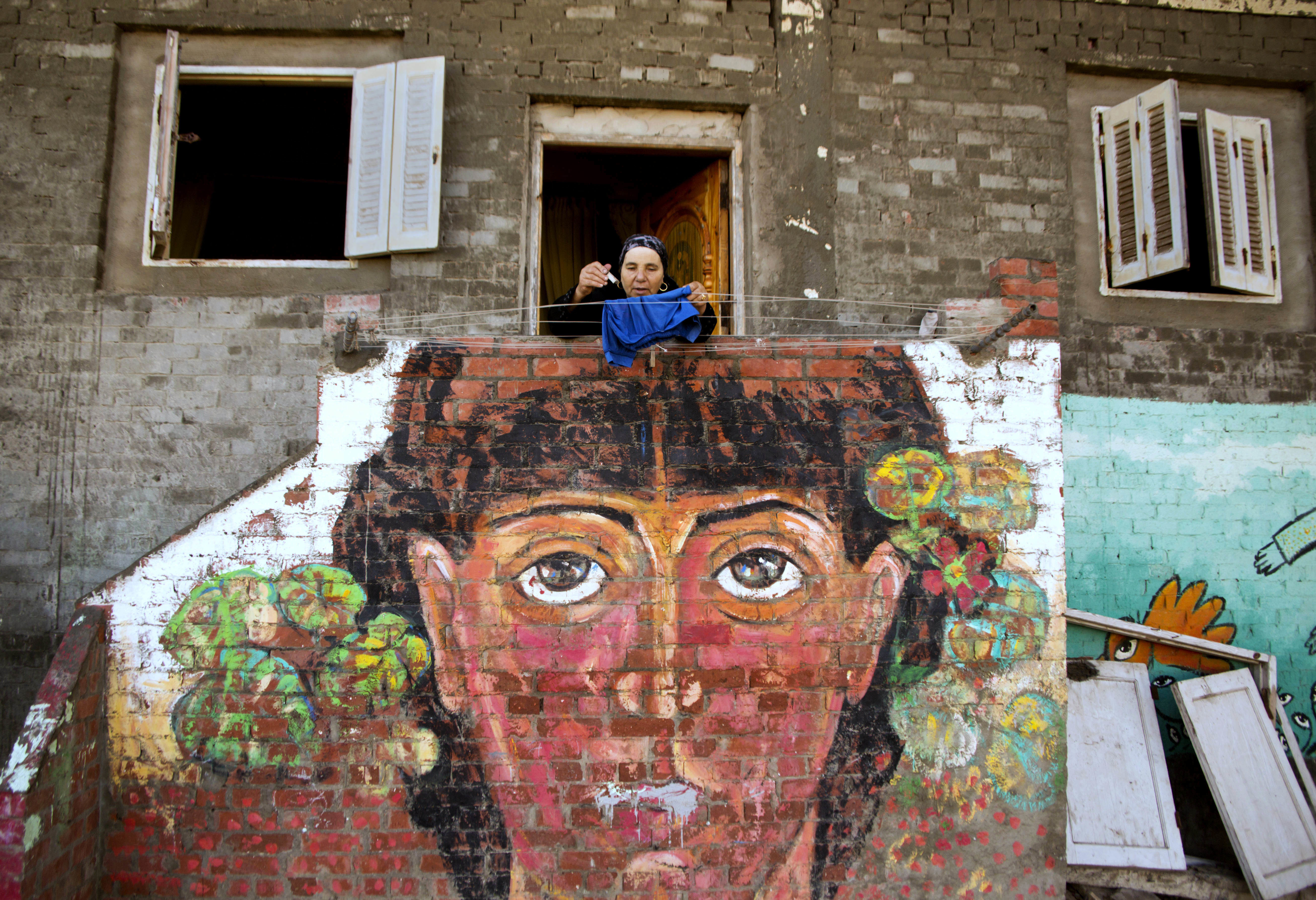 AP PHOTOS: Egyptian fishing town hosts wall art festival