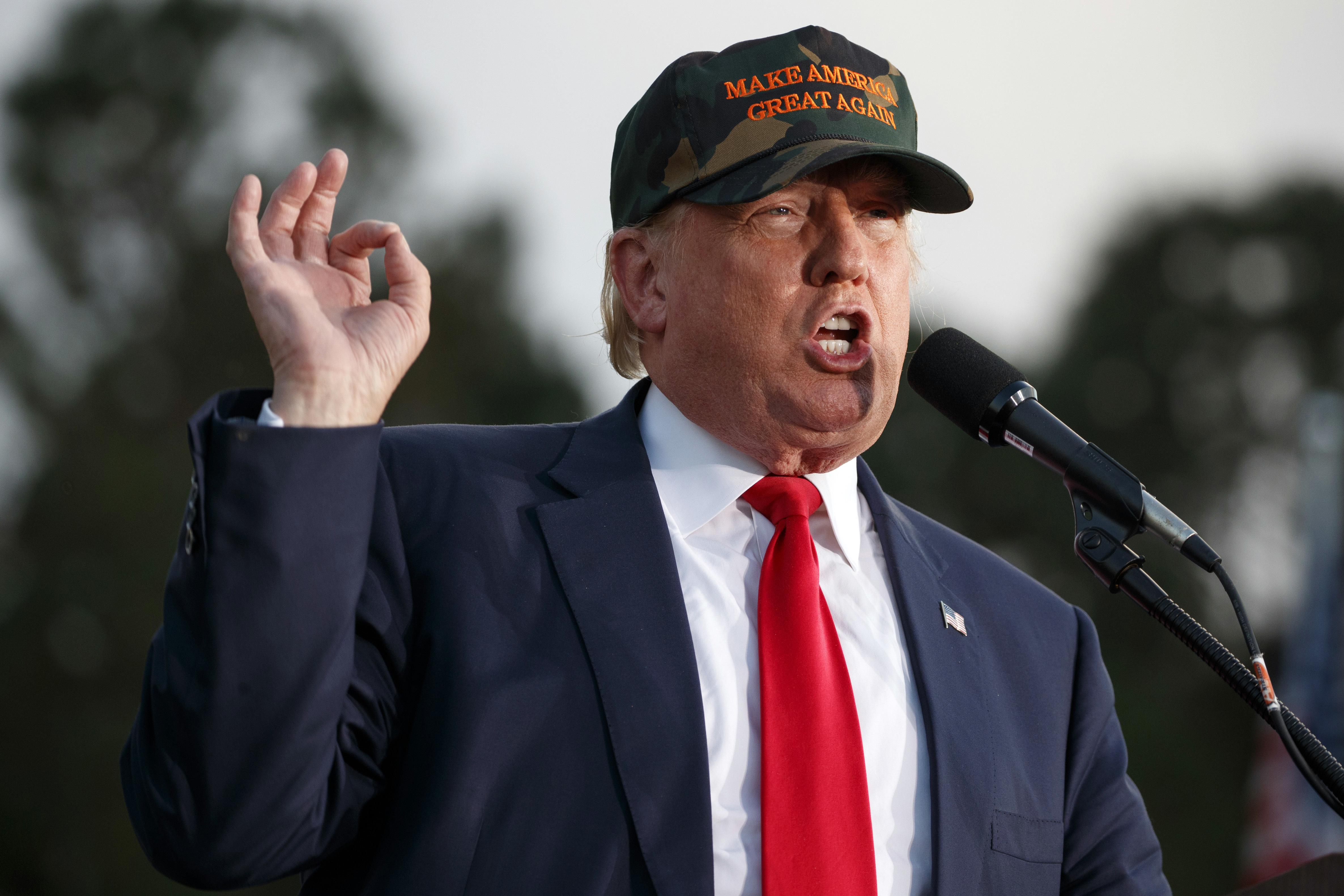 The Latest: Pence scoffs at Clinton's post-election plans