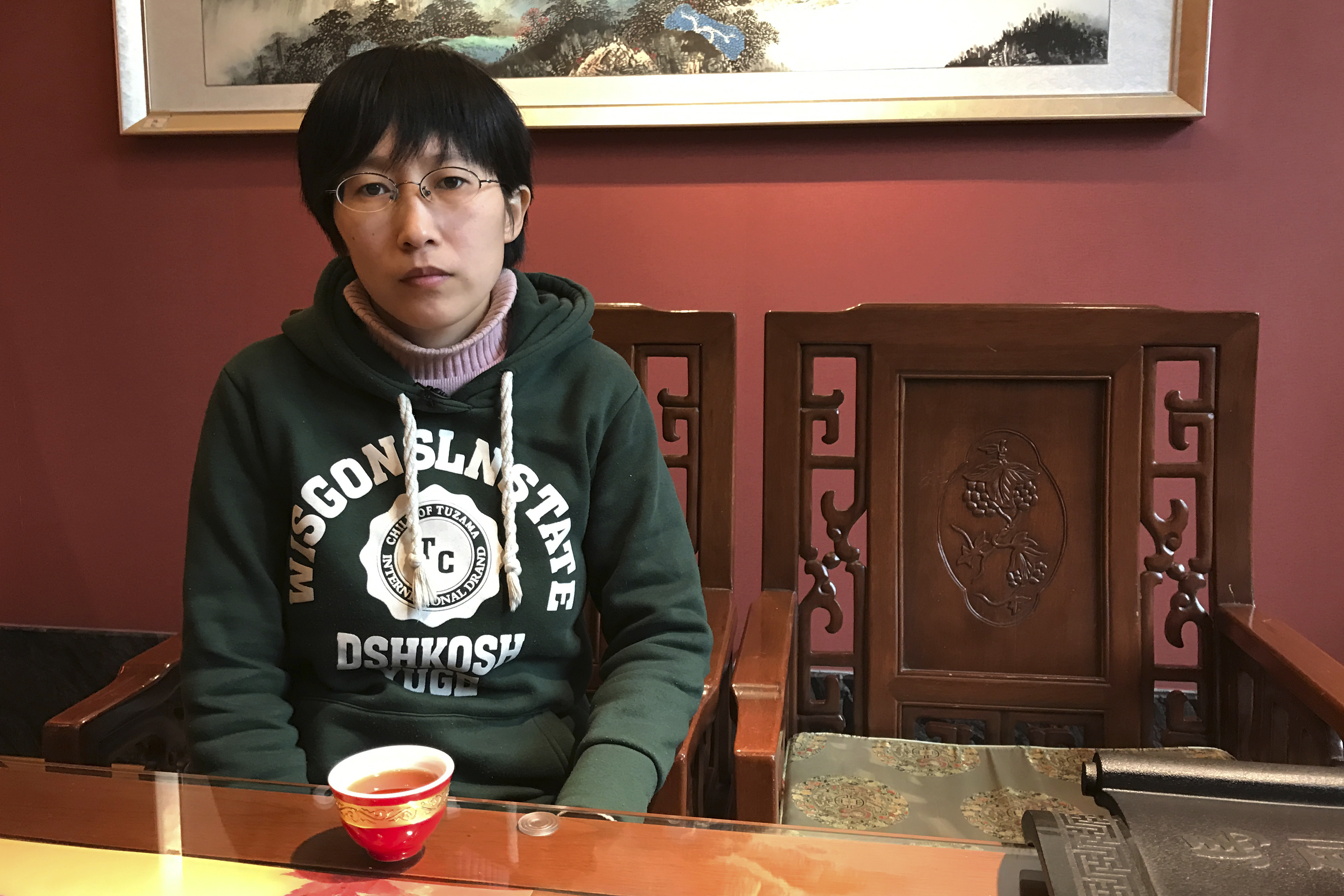 Chinese rally to farmer who killed official with nail gun