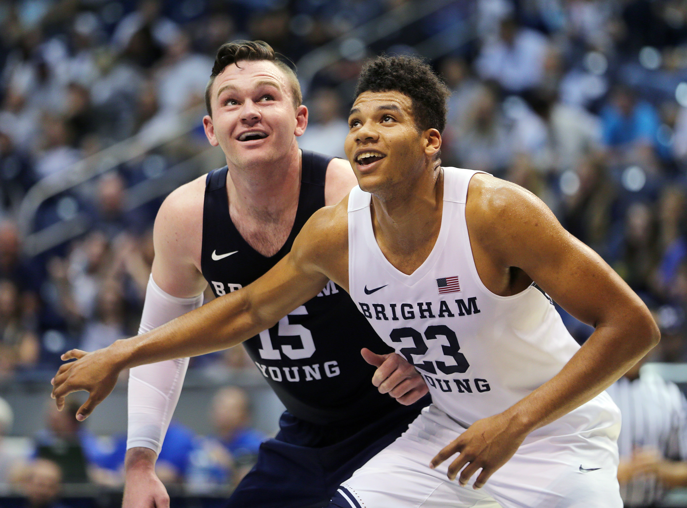 Brigham Young Cougars forward Payton Dastrup (15) and Brigham Young Cougars forward Yoeli Childs (23) laugh as they talk during a free throw during the Cougar Tipoff at the Marriott Center in Provo on Wednesday, Oct. 26, 2016. (Photo: Scott G Winterton, Deseret News)