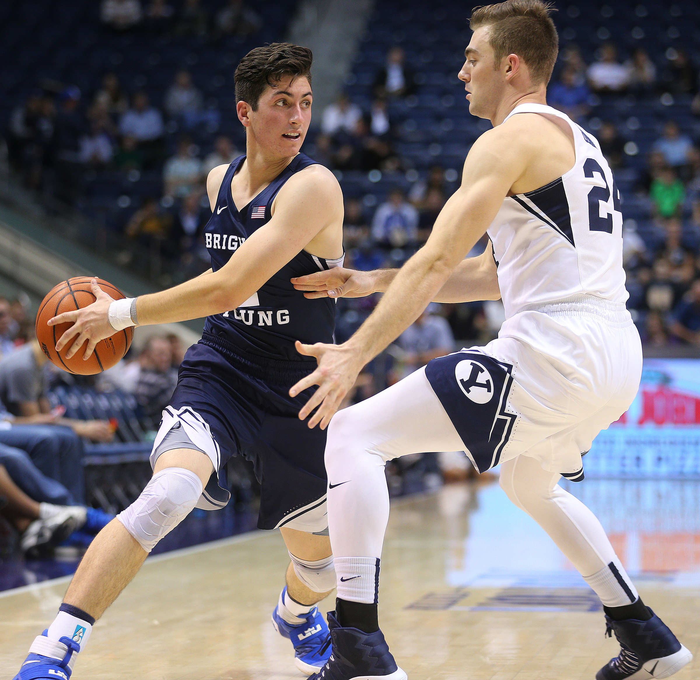 BYU guard Zach Frampton (2) looks to pass around BYU forward Davin Guinn (24) during the Cougar Tipoff at the Marriott Center in Provo on Wednesday, Oct. 26, 2016. (Photo: Scott G Winterton, Deseret News)