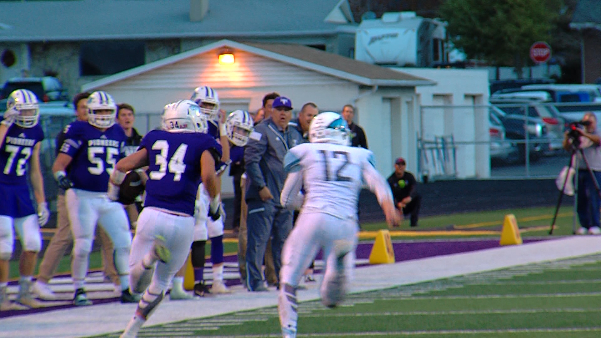 Zach Bingham returns an interception 50 yards for Lehi in the Pioneers' 24-14 win over Sky View in the Class 5A state playoffs Friday at Lehi. (Photo: Matt Glade, KSL TV)