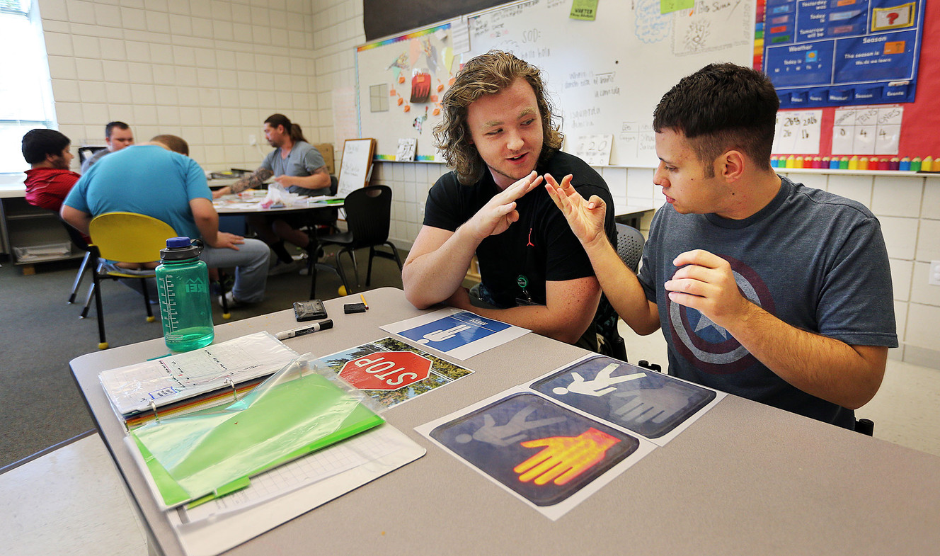 Autism assistant Reilly Teague, left, works with student Jake at the Carmen B. Pingree Autism Center of Learning in Salt Lake City on Wednesday, Oct. 26, 2016. (Photo: Ravell Call, Deseret News)