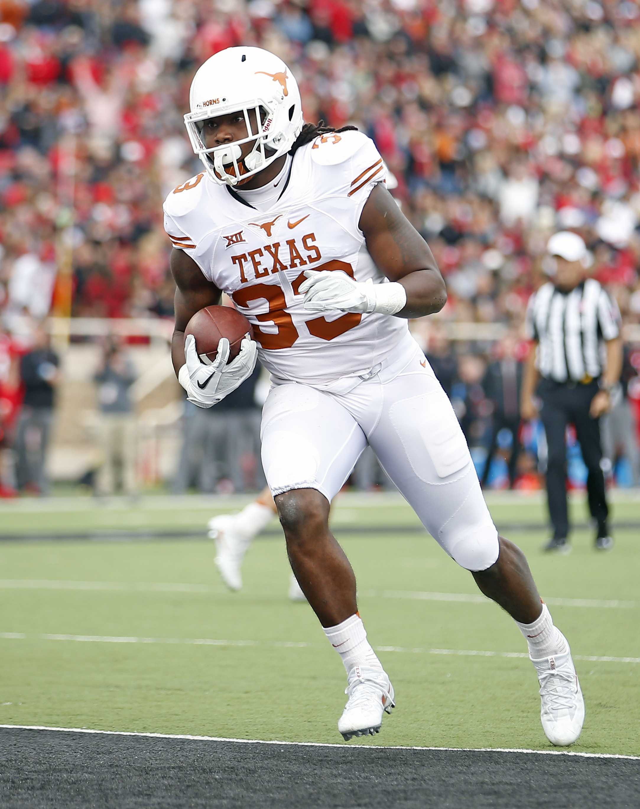 Texas gets 1st road win, downs Texas Tech 45-37
