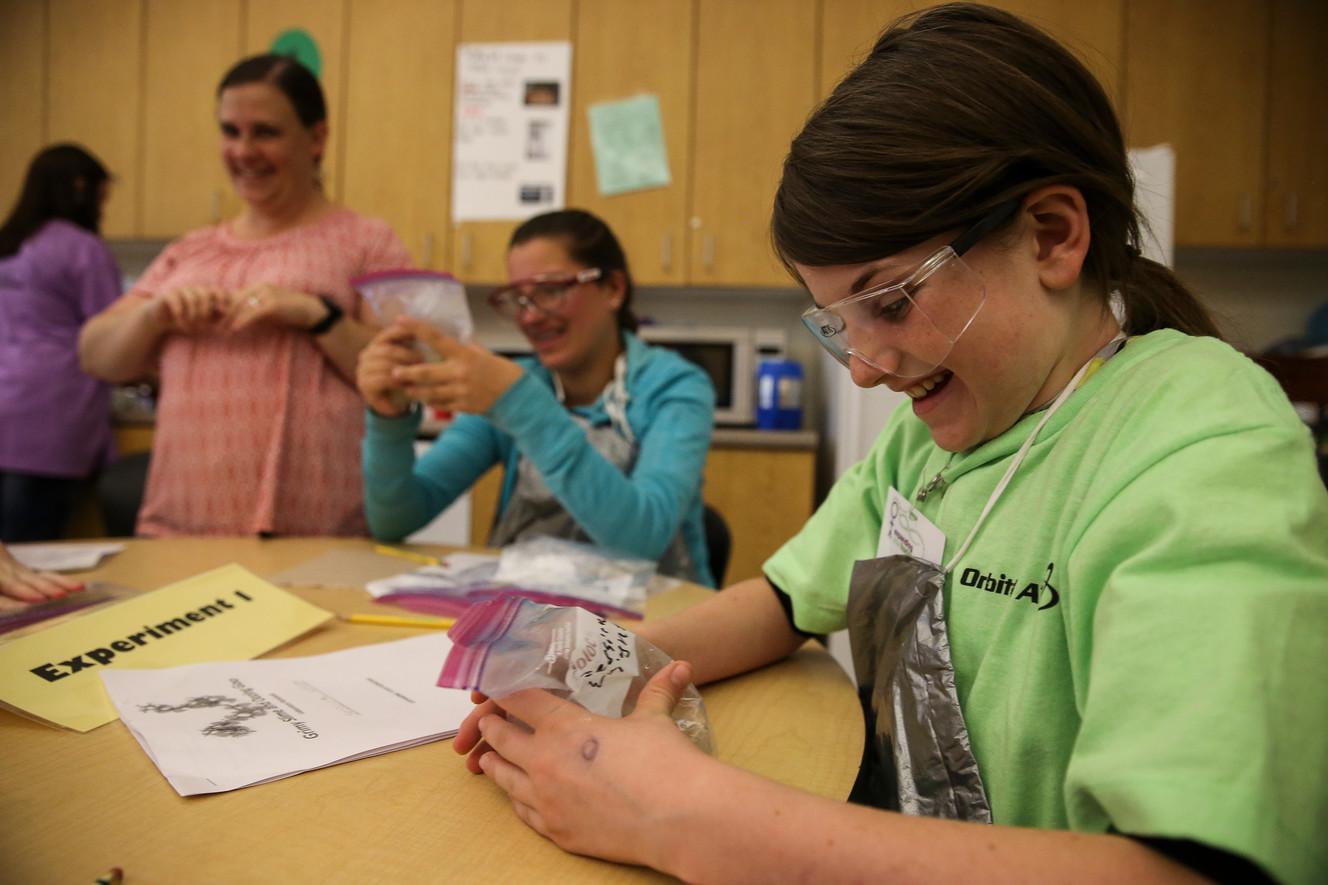 Jessica Wright, right, and other participants make slime in a workshop at the 16th annual Northern Utah Expanding Your Horizons in Science and Mathematics Conference at North Davis Junior High School in Clearfield on Saturday, Nov. 5, 2016. (Photo: Spenser Heaps, Deseret News)