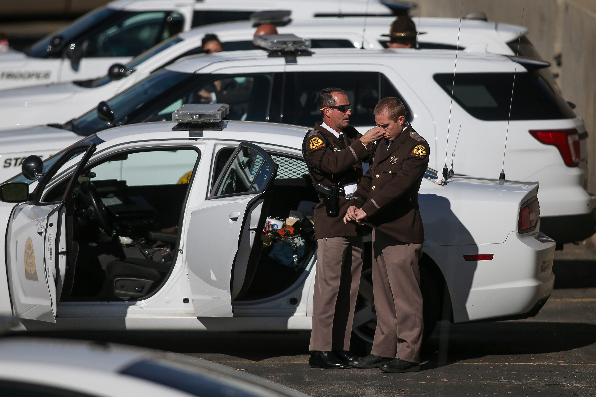 UHP Troopers prepare to serve as an Honor Watch at the State Medical Examiner's office in Salt Lake City on Sunday, Nov. 6, 2016. They will stay with the remains of West Valley City police officer Cody Brotherson, who was hit and killed during a car chase early Sunday morning, until his funeral. (Photo: Spenser Heaps, Deseret News)