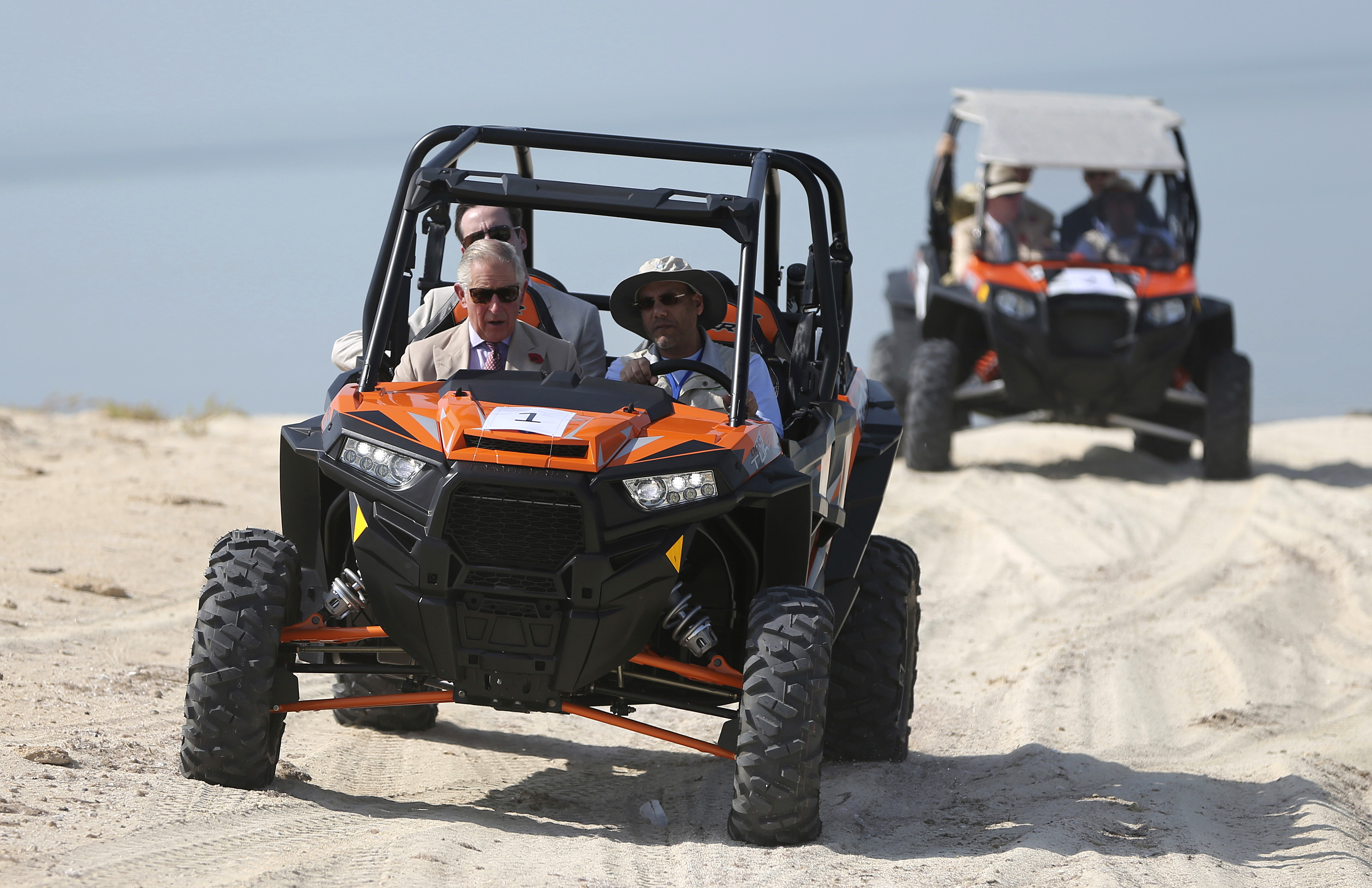Prince Charles sees remote UAE island by dune buggy, boat