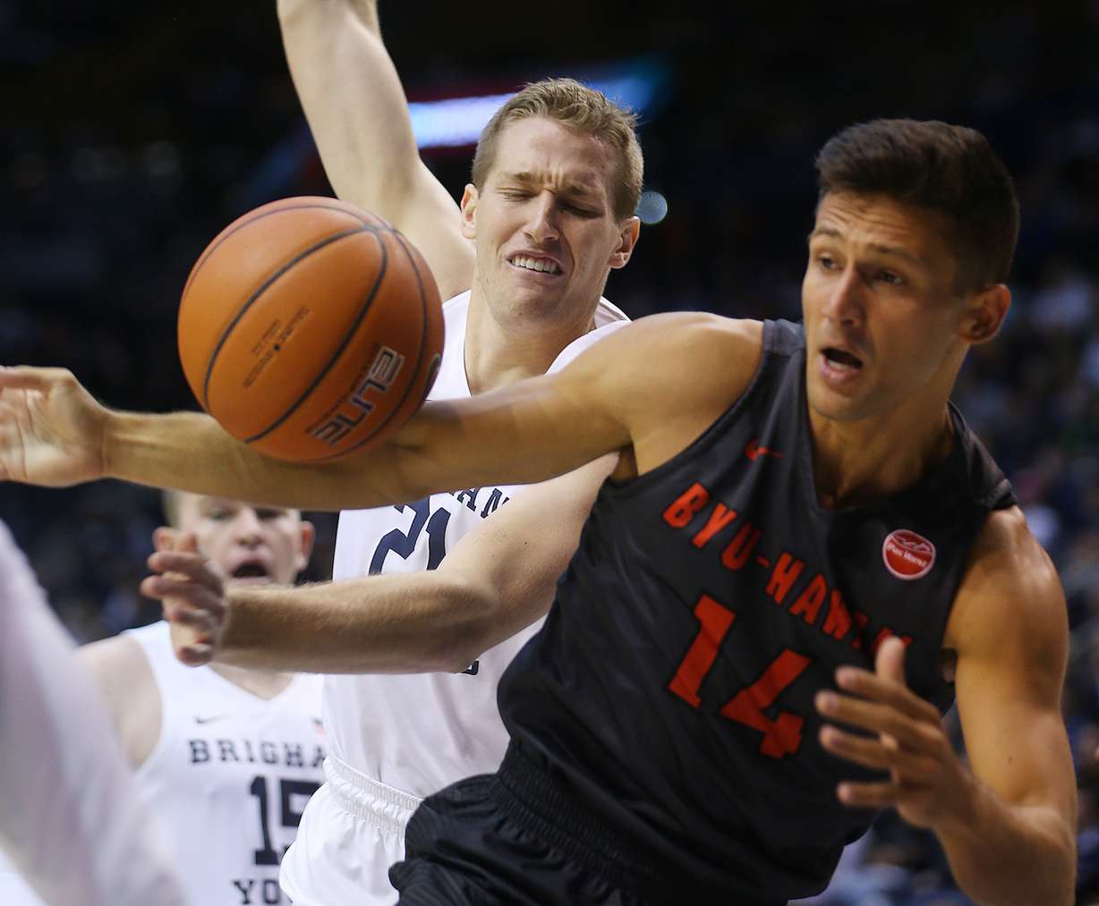 BYU forward Kyle Davis (21) loses the ball with BYU-Hawaii guard Gabriel Andrade (14) defending him as BYU and BYU-Hawaii play in preseason action at the Marriott Center in Provo on Wednesday, Nov. 9, 2016. (Photo: Scott G Winterton, Deseret News)