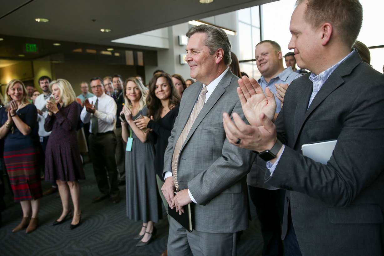 Members of the Deseret News staff applaud after Doug Wilks, center, was named editor at the newspaper's offices in Salt Lake City on Thursday, Nov. 10, 2016. (Photo: Spenser Heaps, Deseret News)