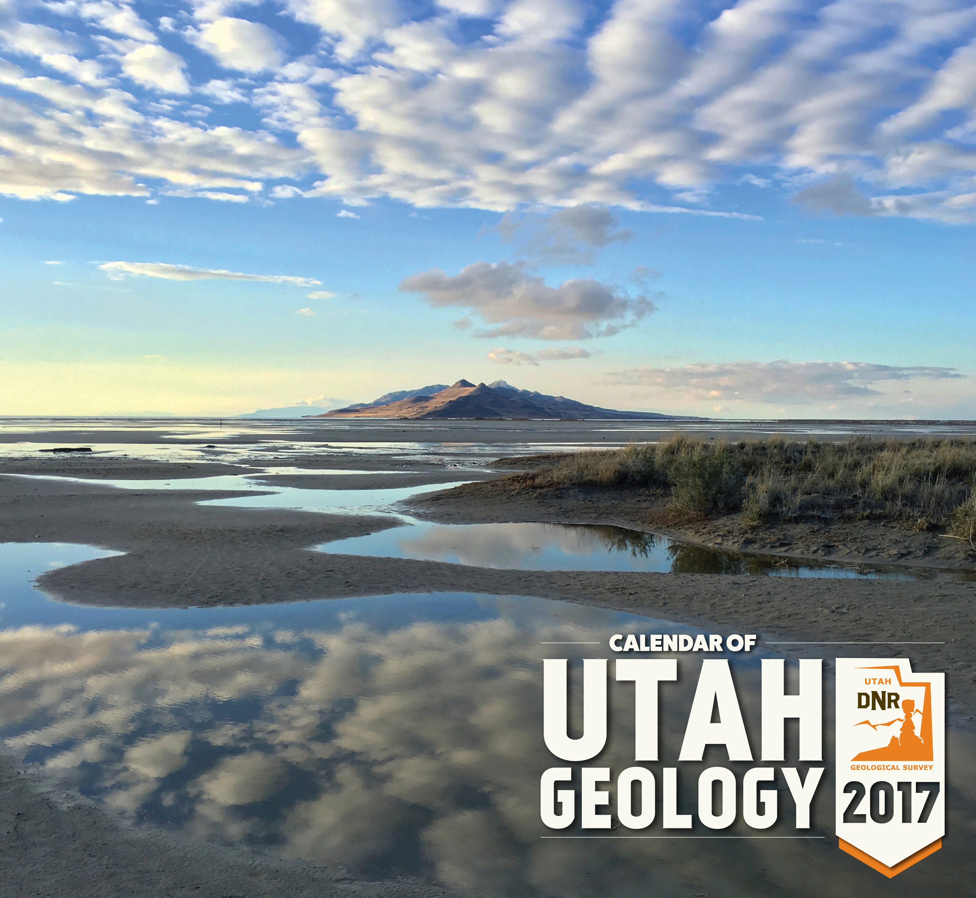 Cover Photo:
Evening skies are reflected in Great Salt Lake south of Antelope Island. Otherworldly scenes of wide mudflats are exposed as lake level nears record low elevation. Cover, Utah Geological Survey’s 2017 Calendar of Utah Geology. Photographer: Andy Cvar