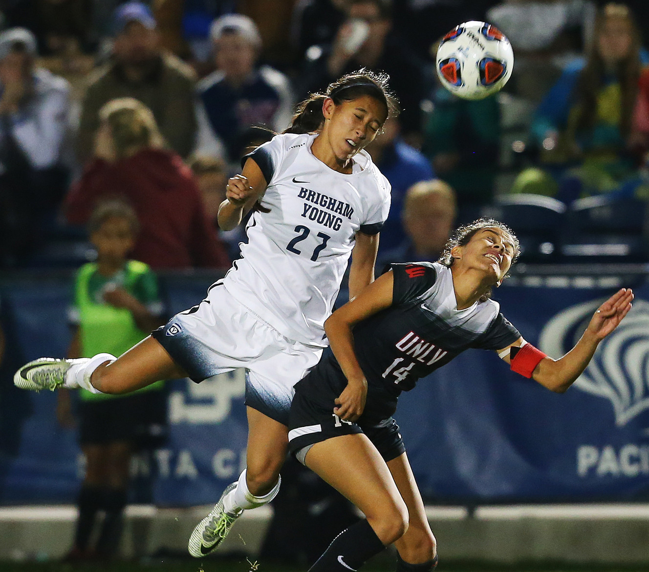 BYU Elena Medeiros (27) goes over the top of UNLV Susie Bernal (14) for the ball as BYU and UNLV play in the first round of the NCAA tournament in Provo on Friday, Nov. 11, 2016. (Photo: Scott G Winterton, Deseret News)