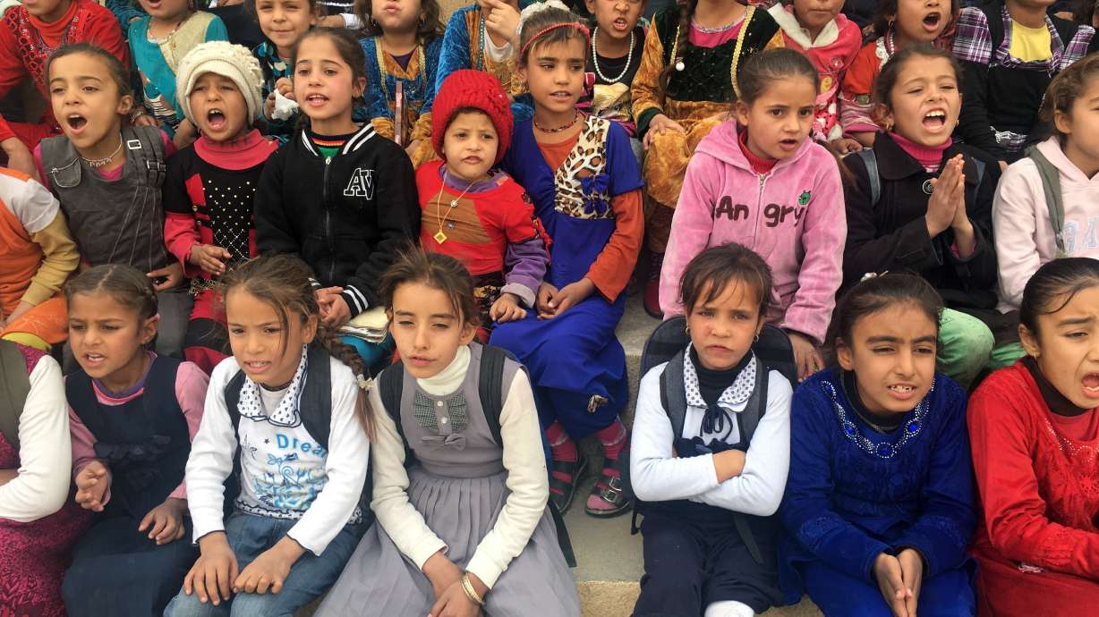 Iraqi children return to school in village freed of IS group