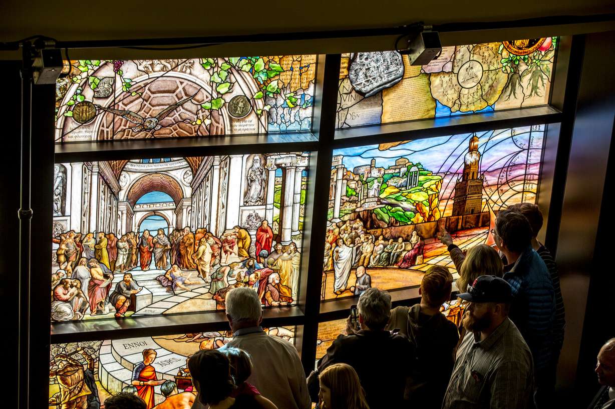 The crowd gets a close look at the stained glass after the unveiling of the “Roots of Knowledge." Photo: Jay Drowns, UVU Marketing