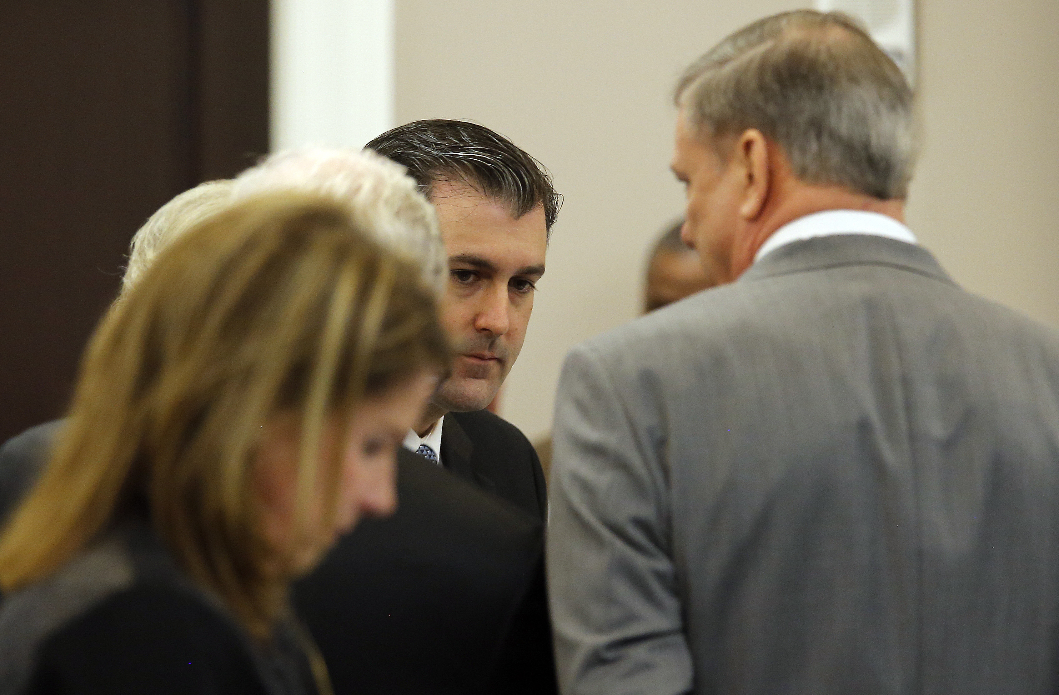 The Latest: Court adjourns; closing arguments Wednesday