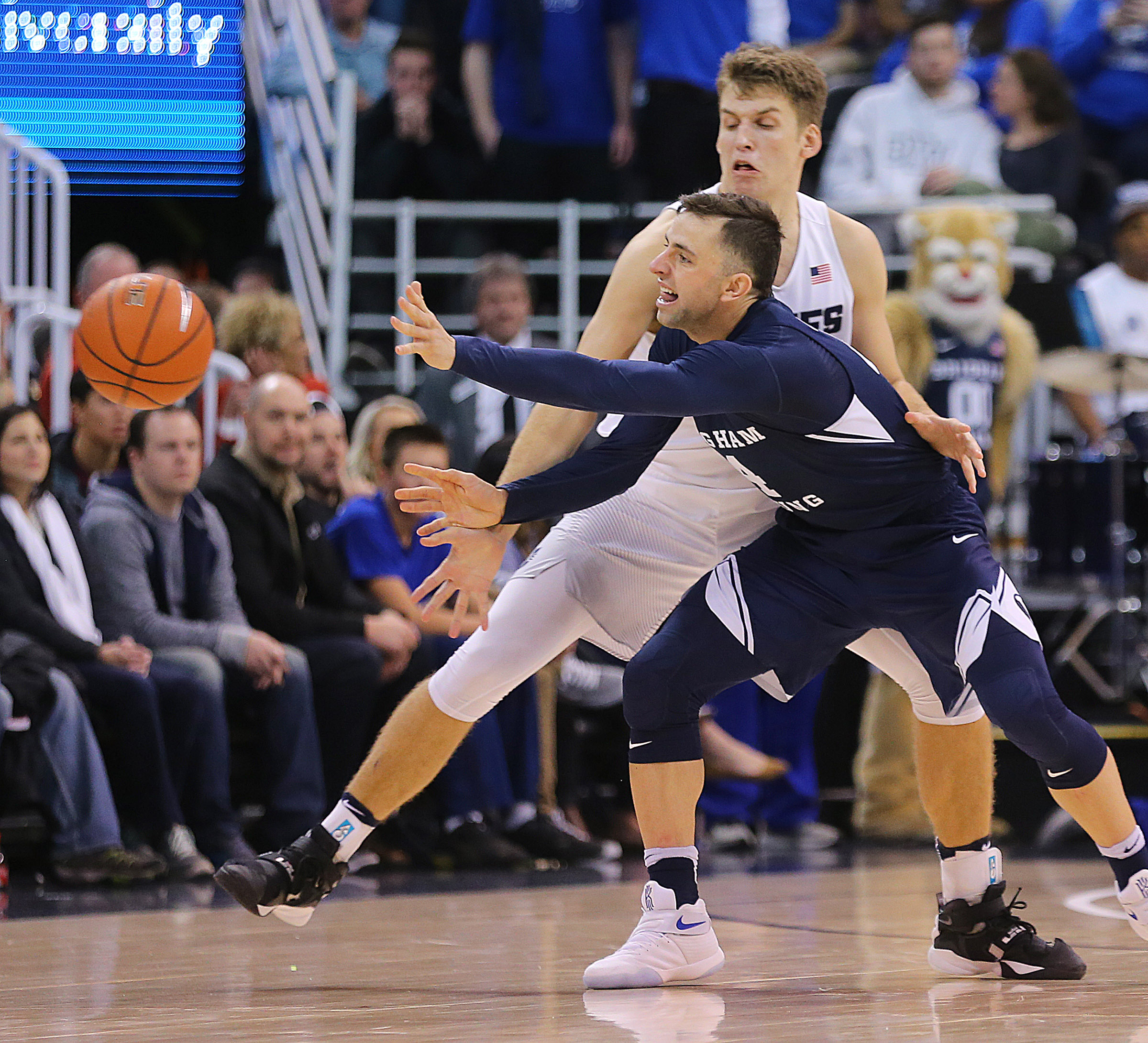 BYU guard Nick Emery (4) is defended by Utah State forward Quinn Taylor (10) as BYU and USU play at Vivint Smart Home Arena in Salt Lake City on Wednesday, Nov. 30, 2016.