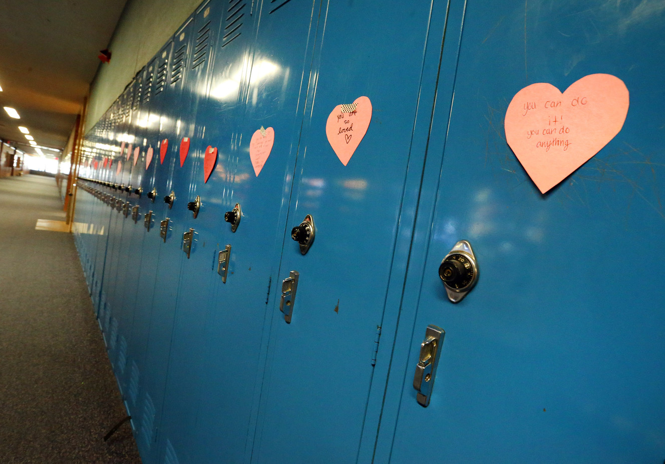 Hundreds of paper hearts line the lockers at Mueller Park Junior High School in Bountiful on Friday, Dec. 2, 2016, a day after a student fired a gun inside the school. (Photo: Scott G Winterton, Deseret News)