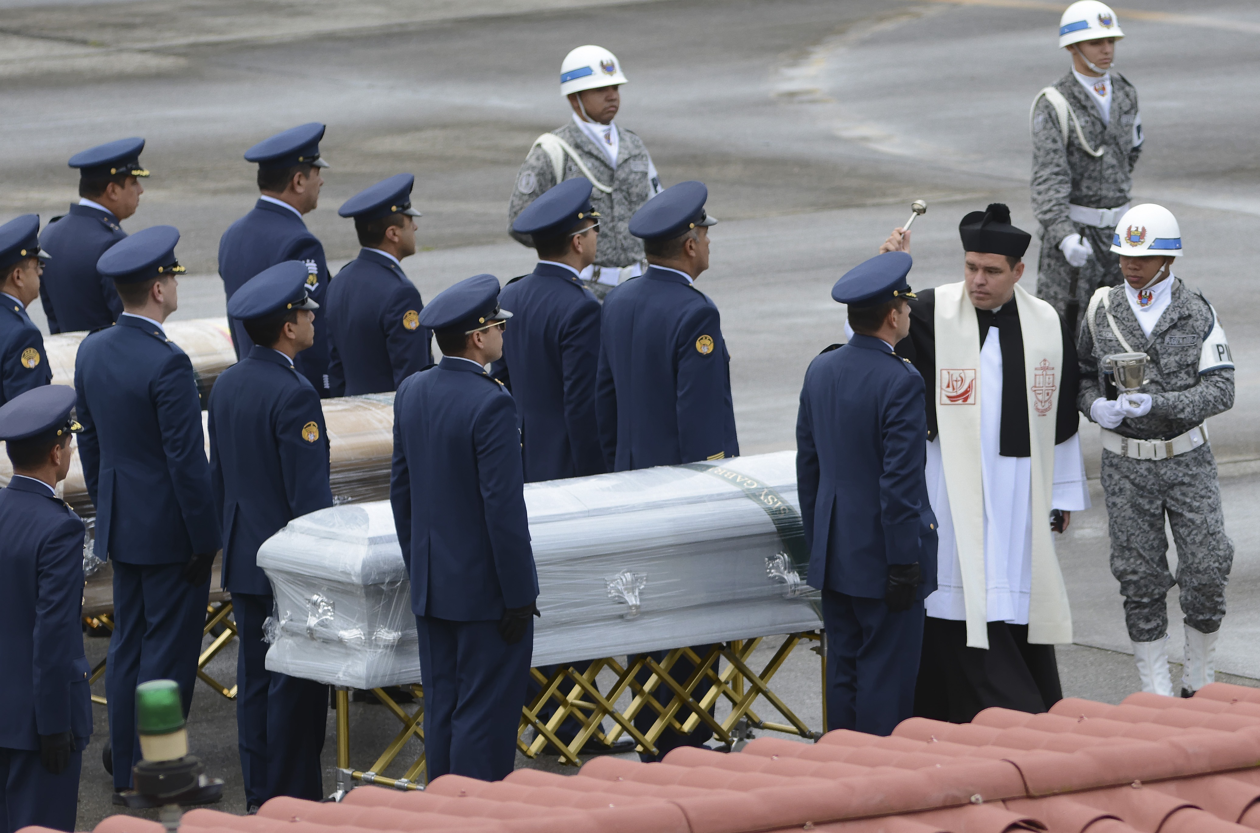 The Latest: Colombia repatriates dead, crash investigated